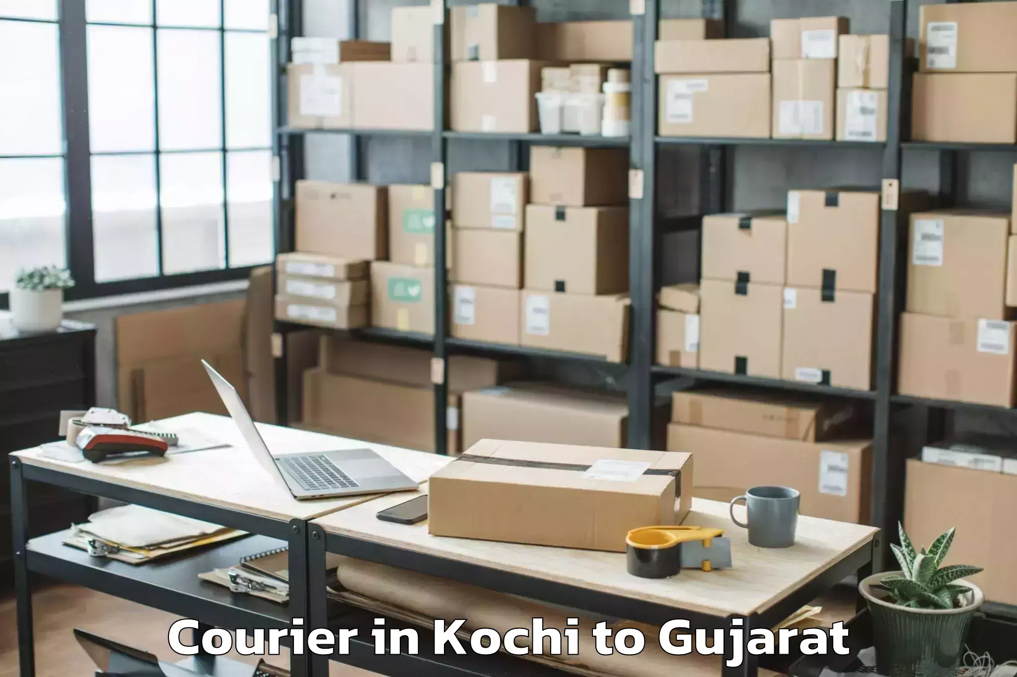 Affordable Kochi to Delvada Courier